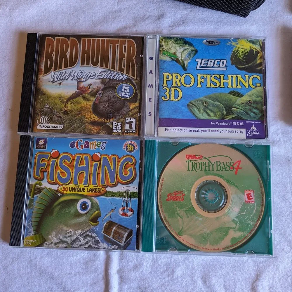 Bundle of 8 PC games and CD Carry Case